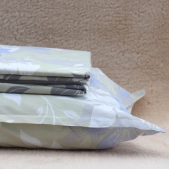 Lenzuola matrimoniali con foglie dai colori neutri: collezione Talete