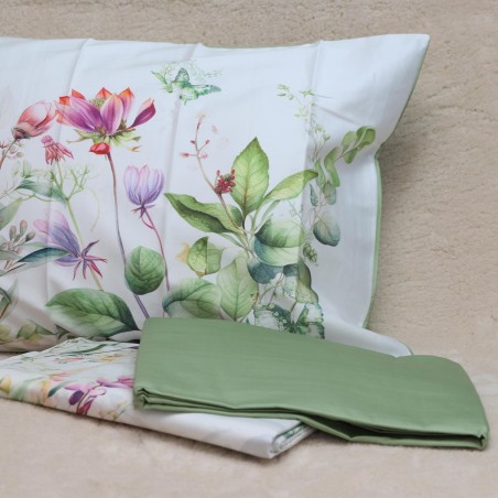 Lenzuola matrimoniali con fiori e foglie vivaci su sfondo bianco collezione Castalia