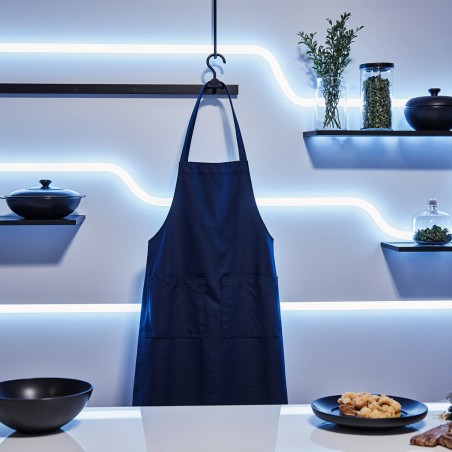 Grembiule tinta unita blu scuro in 100% cotone con due tasche. Collezione Zefiro: stile essenziale e funzionale.
